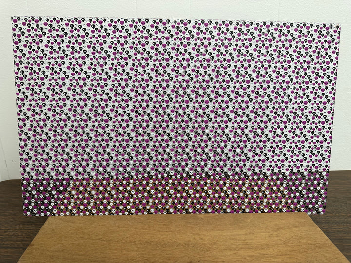 PatternPly® Scattered Purple, Black, and White Skulls