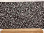 PatternPly® Full Coverage Large White Spiderwebs on Black Background sheet showing the pattern