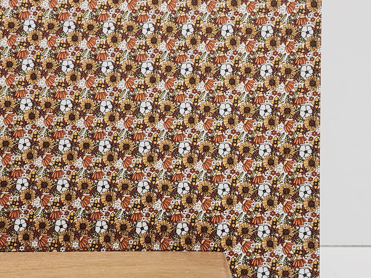 PatternPly® Scattered 70s Floral Orange sheet showing the pattern