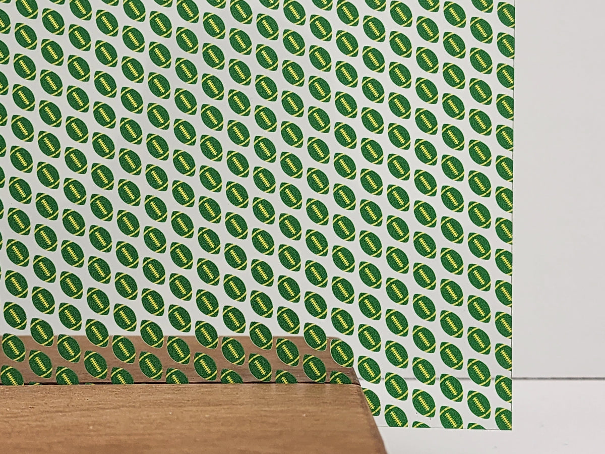 PatternPly® Scattered Green and Yellow Footballs sheet showing the pattern