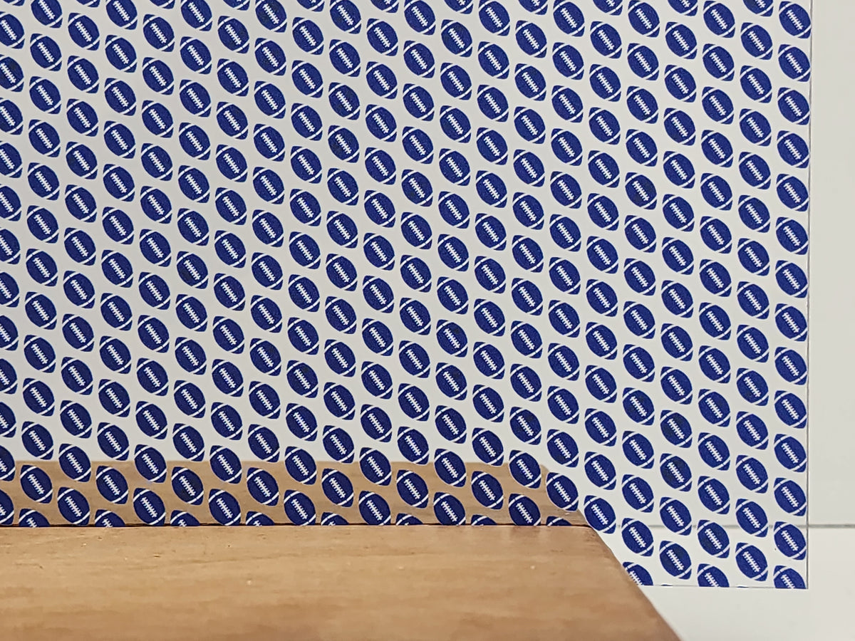 PatternPly® Scattered Blue and White Footballs sheet showing the pattern