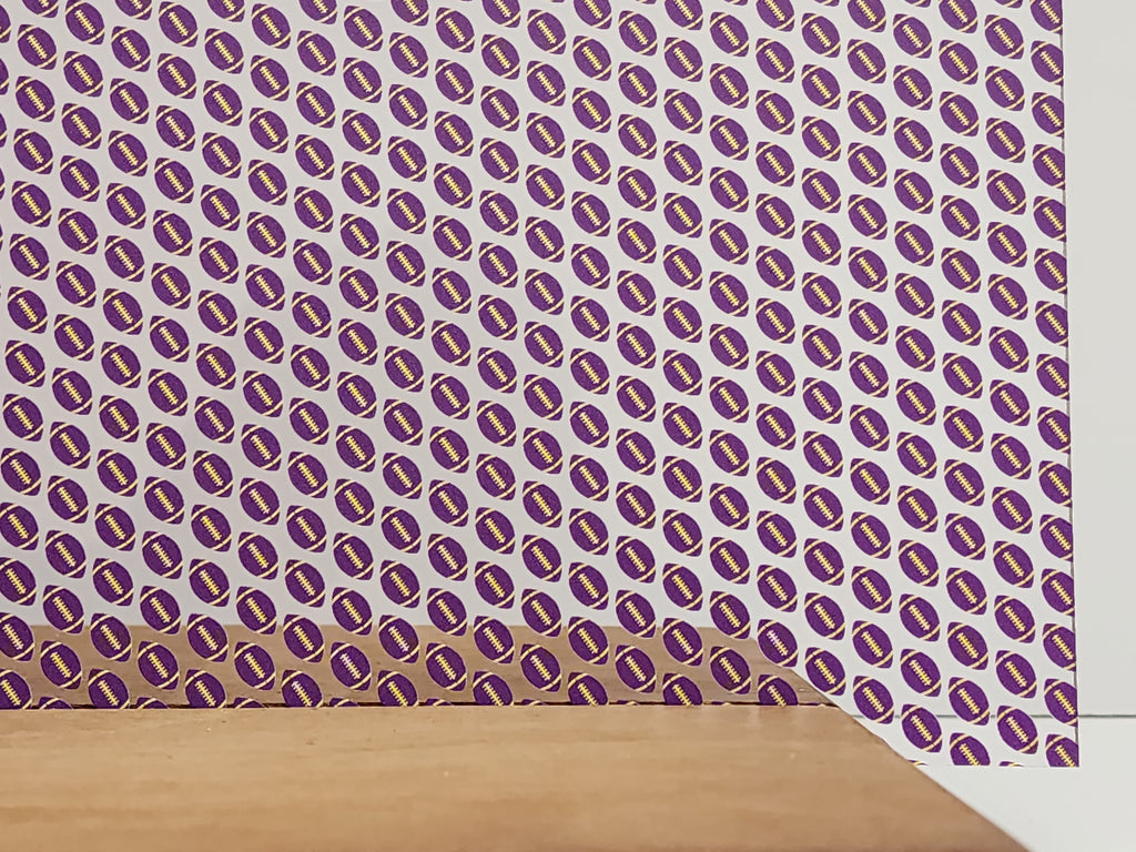 PatternPly® Scattered Purple and Yellow Footballs sheet showing the pattern