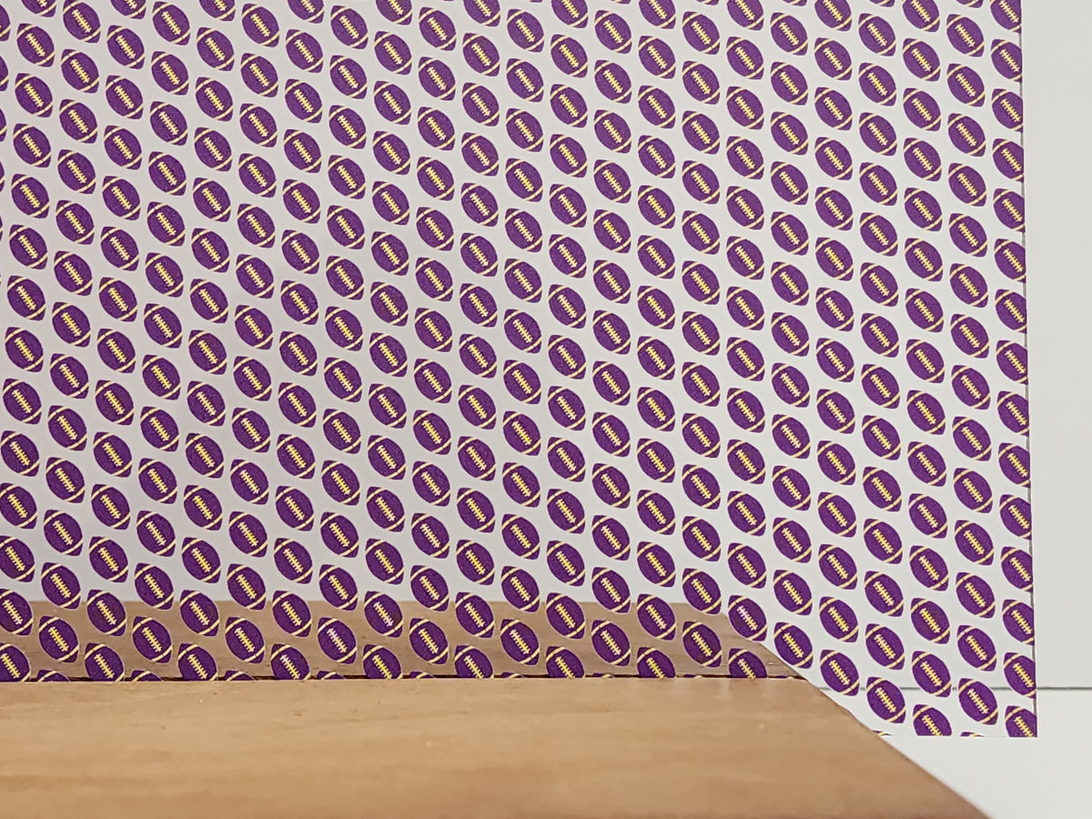 PatternPly® Scattered Purple and Yellow Footballs sheet showing the pattern