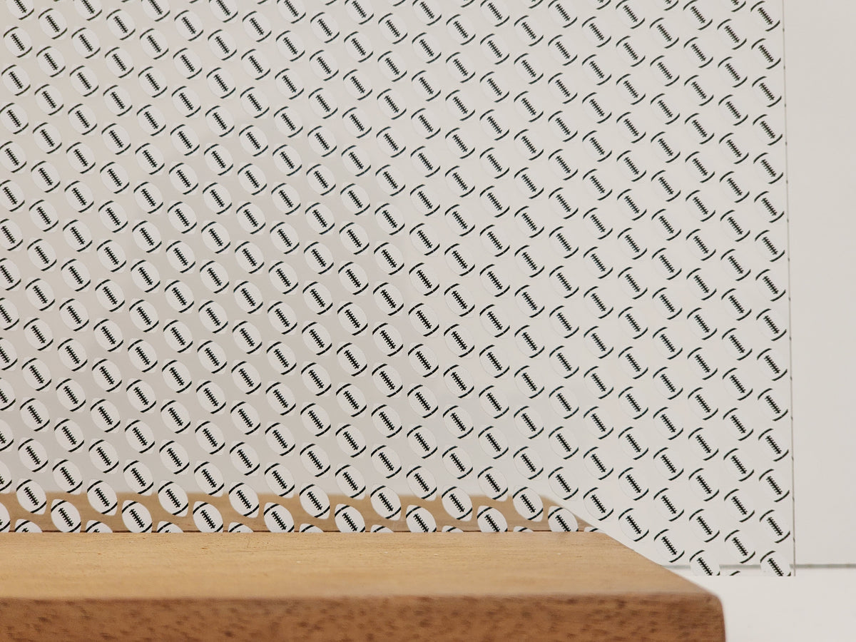 PatternPly® Scattered White Footballs sheet showing the pattern