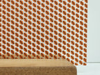PatternPly® Scattered Orange and Black Footballs sheet showing the pattern