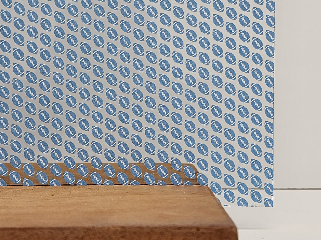PatternPly® Scattered Light Blue and White Footballs sheet showing the pattern