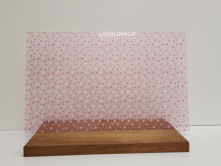 PatternPly® Scattered Pink Snowflakes