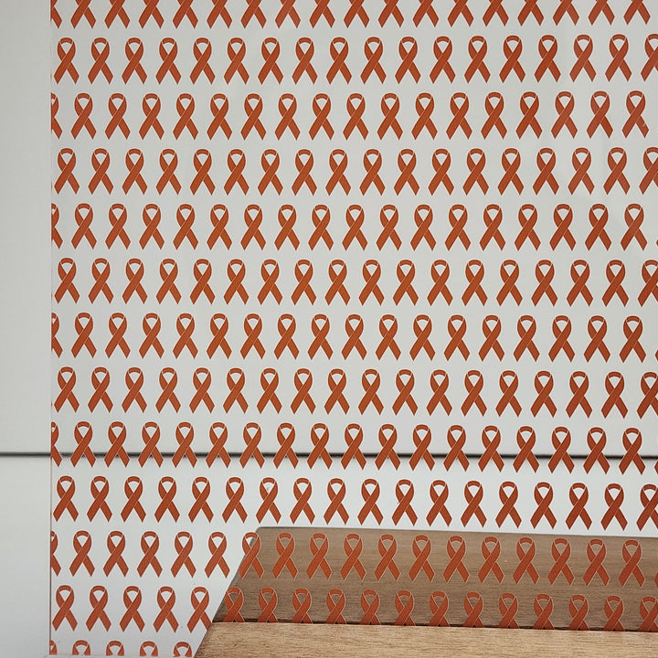 PatternPly® Scattered Orange Ribbons