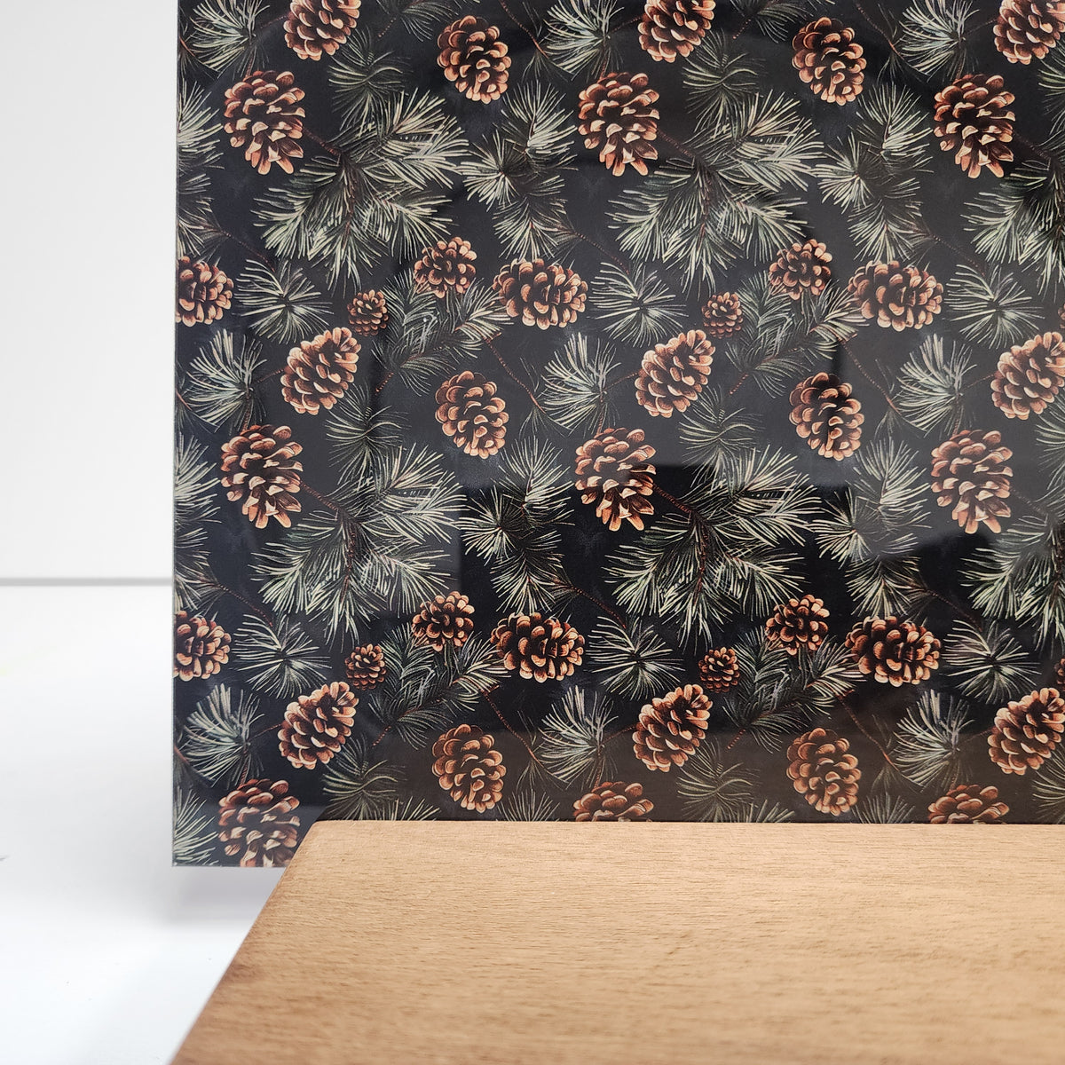 PatternPly® Full Coverage Pine Needles and Pinecones sheet showing the pattern