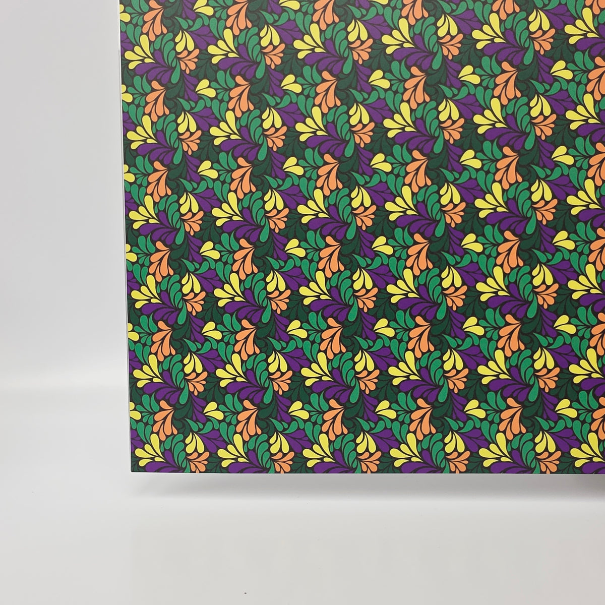 PatternPly® Full Coverage Mardi Gras Swirls sheet showing the pattern