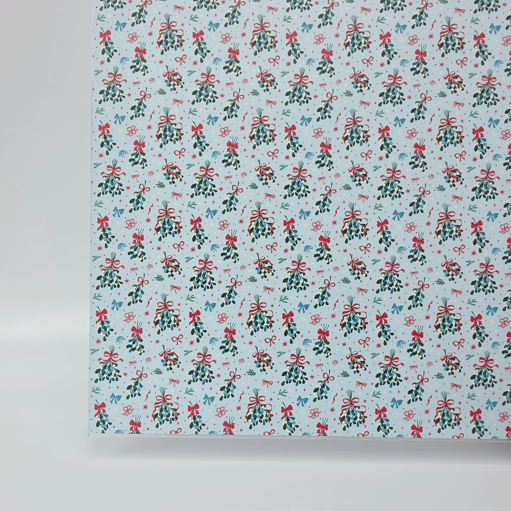 PatternPly® Full Coverage Mistletoe and Bows on Blue sheet showing the pattern