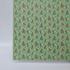 PatternPly® Full Coverage Mistletoe and Bows on Green sheet showing the pattern