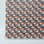 PatternPly® Full Coverage Skulls and Pumpkins MICRO sheet showing the pattern
