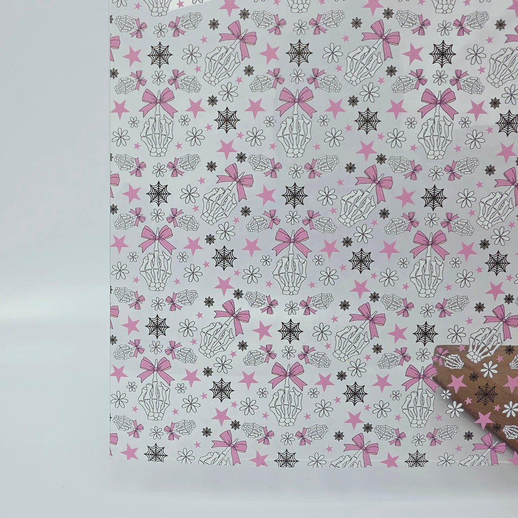 PatternPly® Scattered Fingers and Bows sheet showing the pattern
