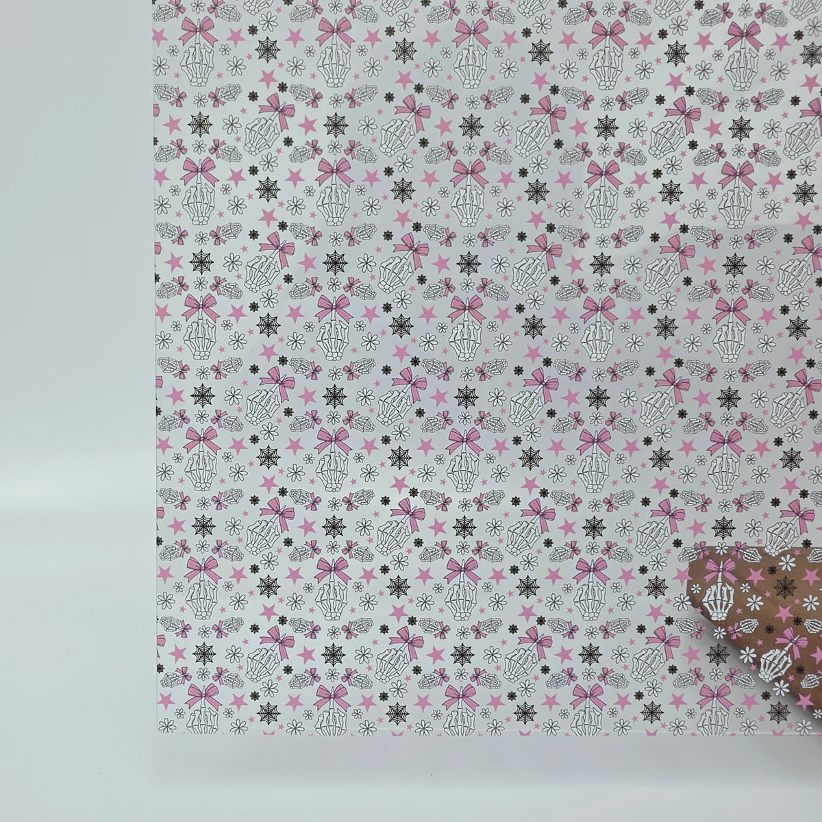 PatternPly® Scattered Fingers and Bows MICRO sheet showing the pattern