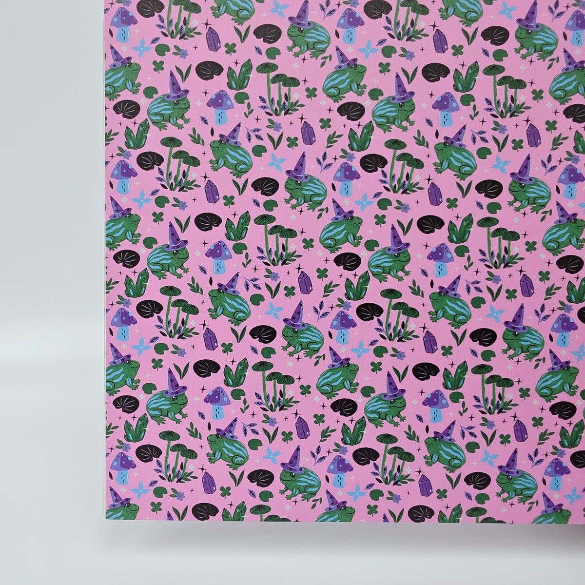 PatternPly® Full Coverage Witchy Frogs on Pink sheet showing the pattern