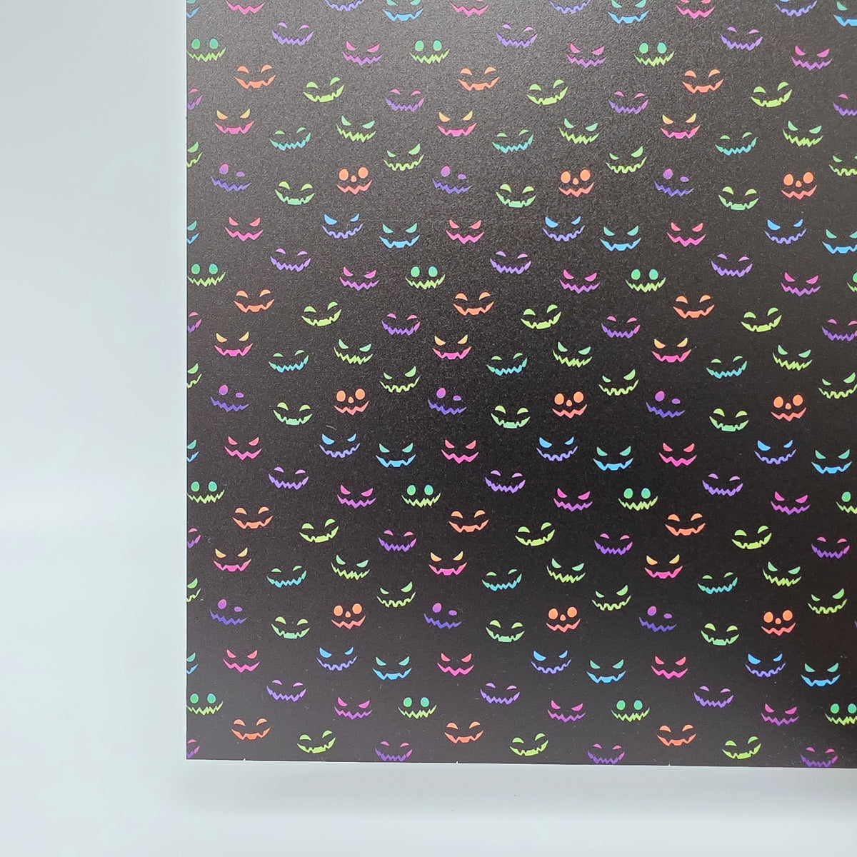 PatternPly® Full Coverage Neon Spooky Faces sheet showing the pattern
