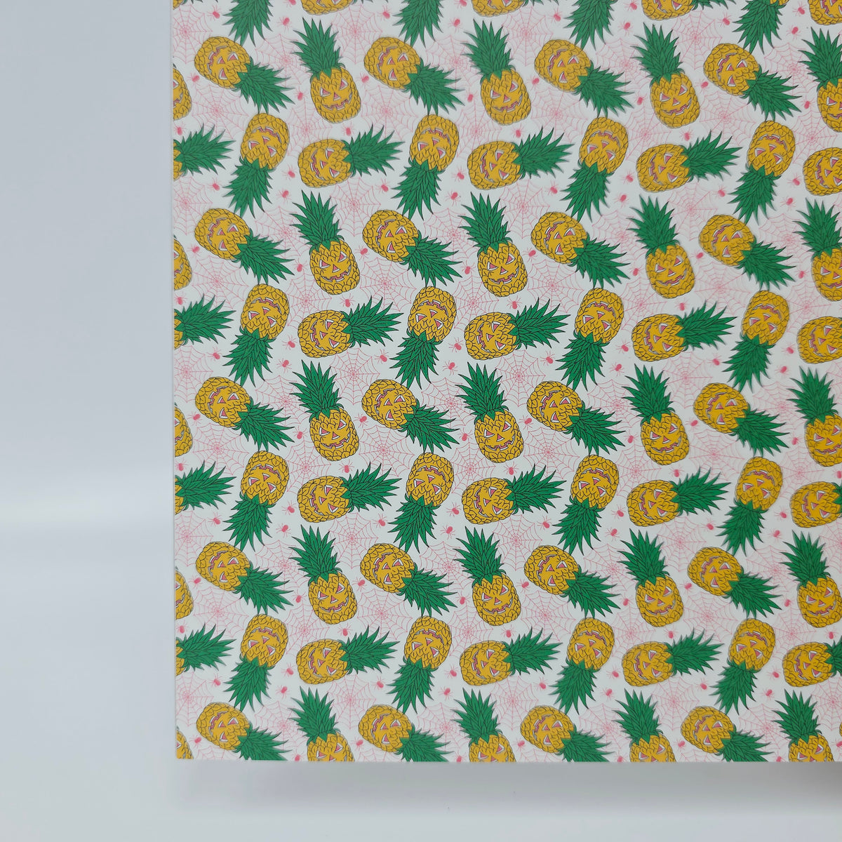 PatternPly® Full Coverage Jack-o-Pineapples on White sheet showing the pattern
