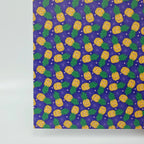 PatternPly® Full Coverage Jack-o-Pineapples on Purple sheet showing the pattern