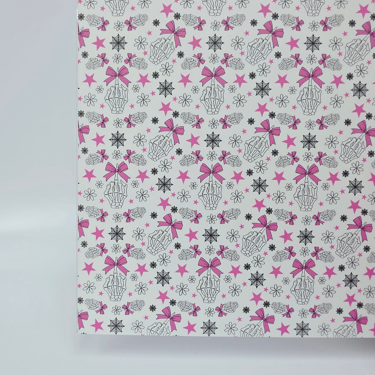 PatternPly® Full Coverage Fingers and Bows on White sheet showing the pattern