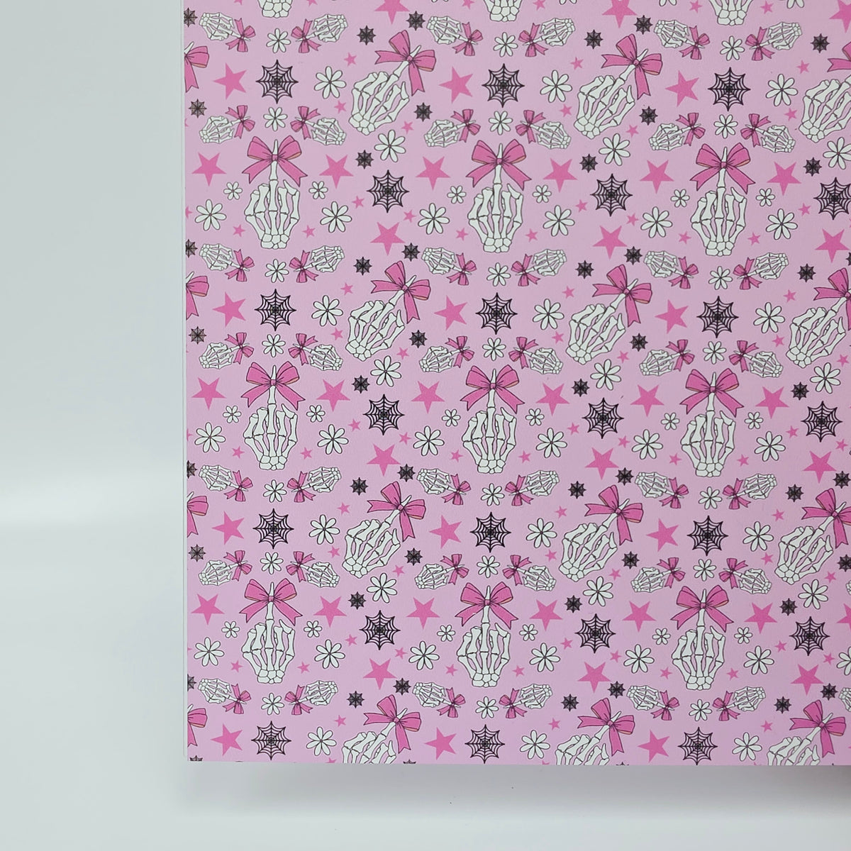 PatternPly® Full Coverage Fingers and Bows on Pink sheet showing the pattern
