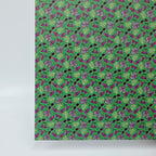 PatternPly® Full Coverage BikiniWeen on Green MICRO sheet showing the pattern