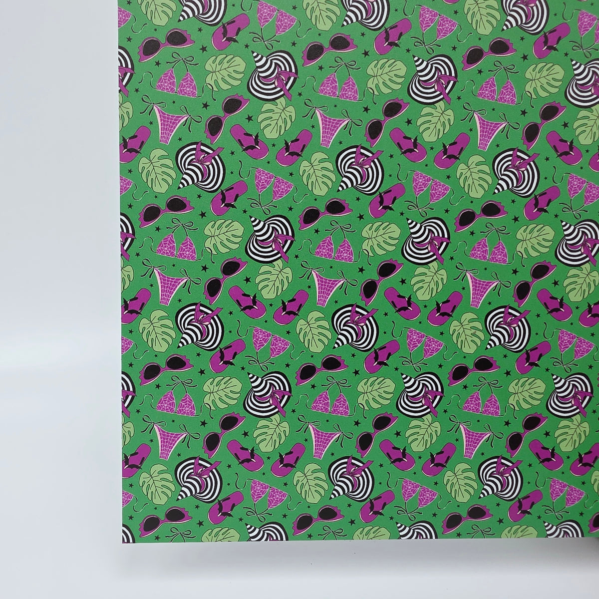 PatternPly® Full Coverage BikiniWeen on Green sheet showing the pattern