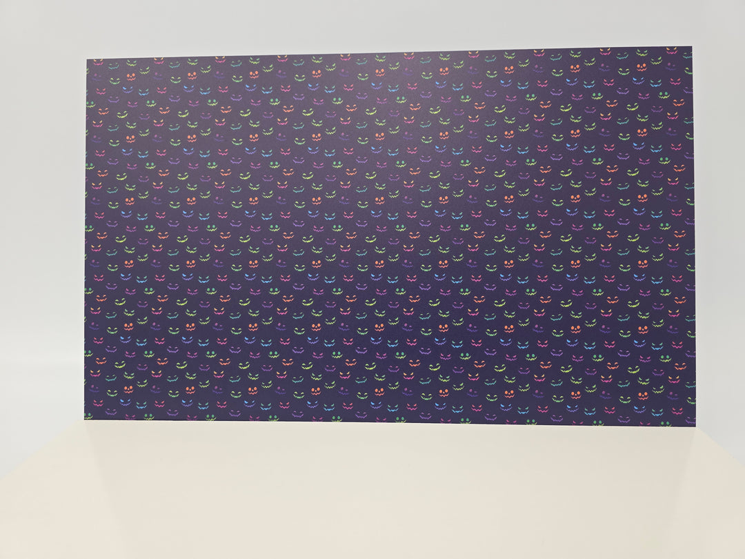 PatternPly® Full Coverage Neon Spooky Faces On Purple