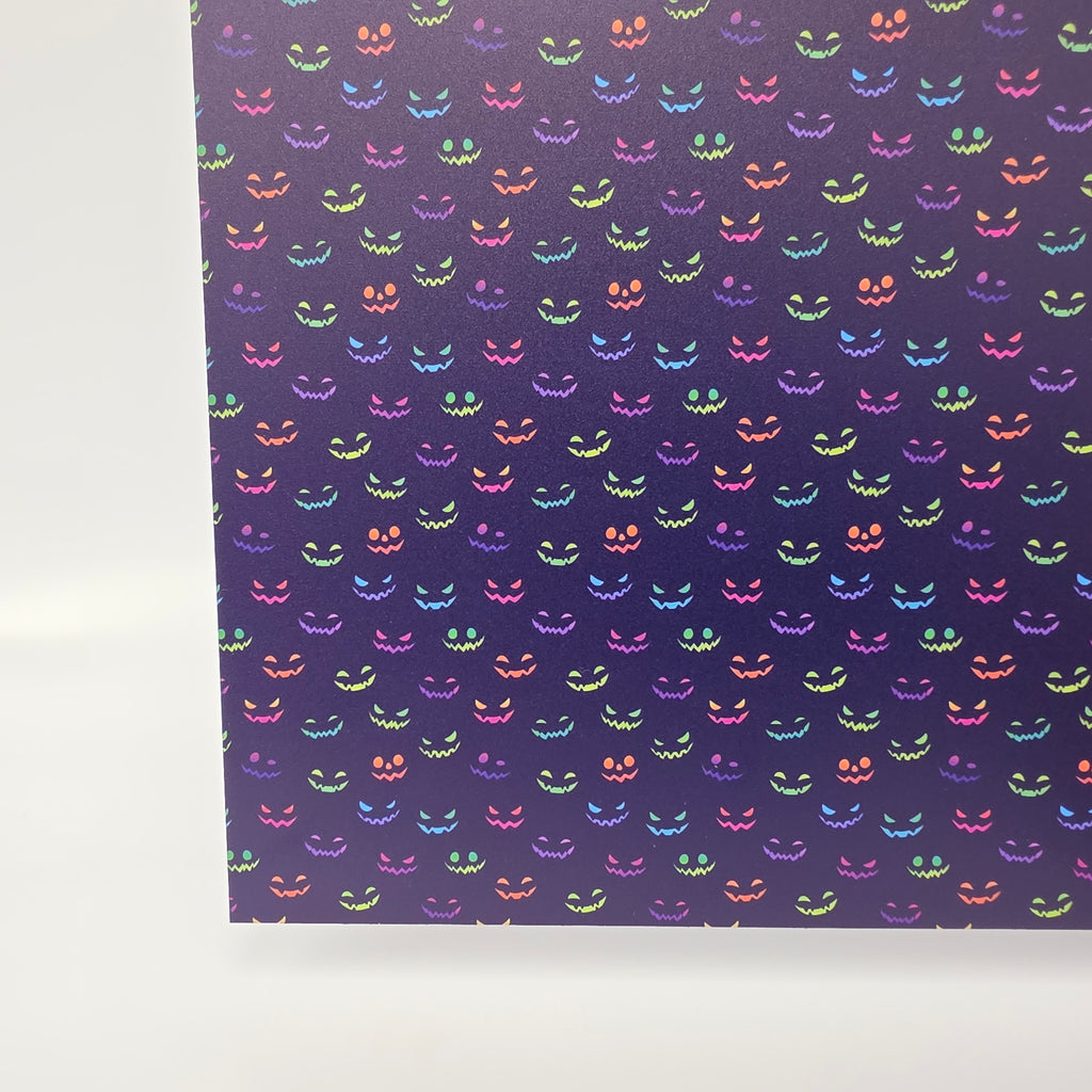 PatternPly® Full Coverage Neon Spooky Faces On Purple sheet showing the pattern