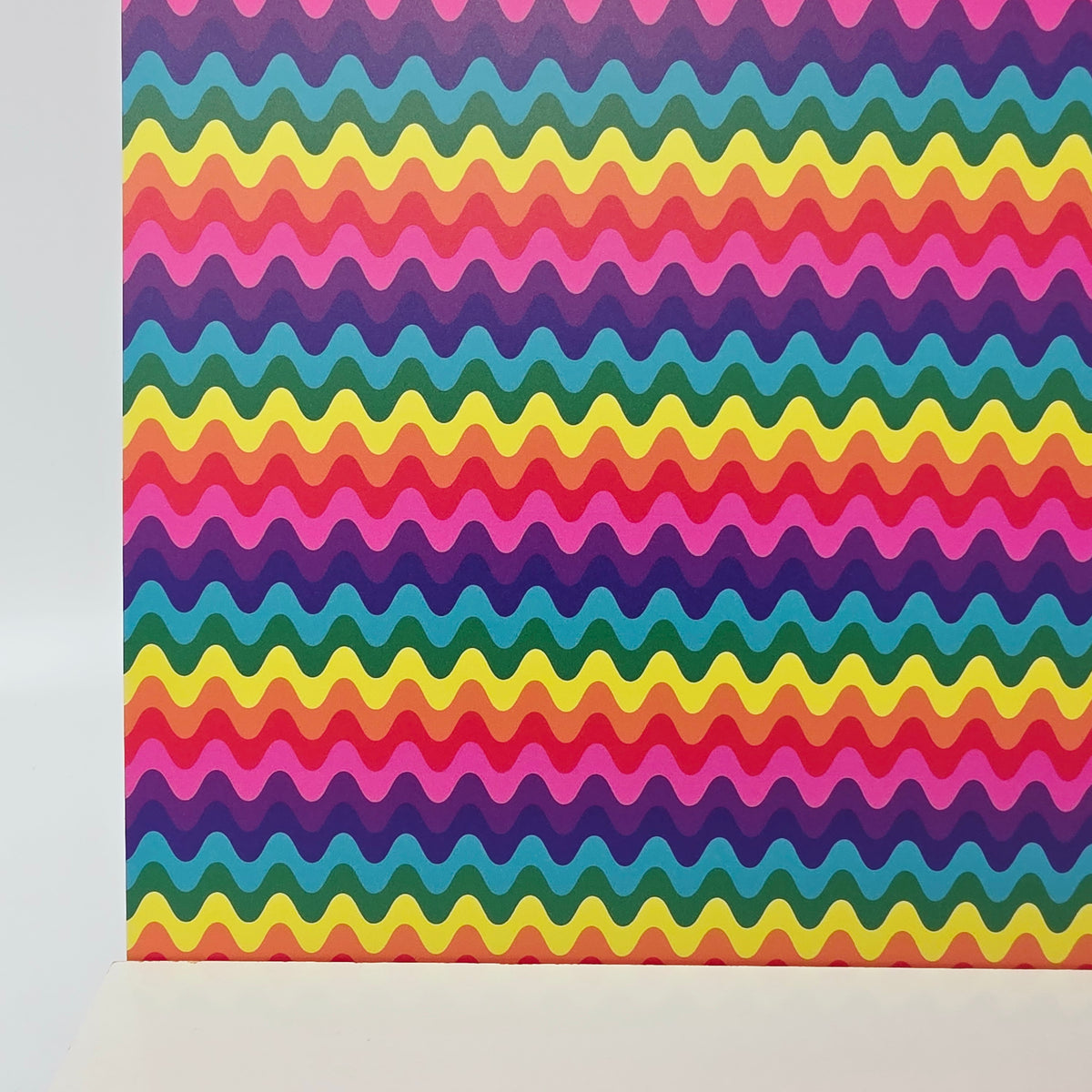 PatternPly® Full Coverage Groovy Rainbow Waves sheet showing the pattern