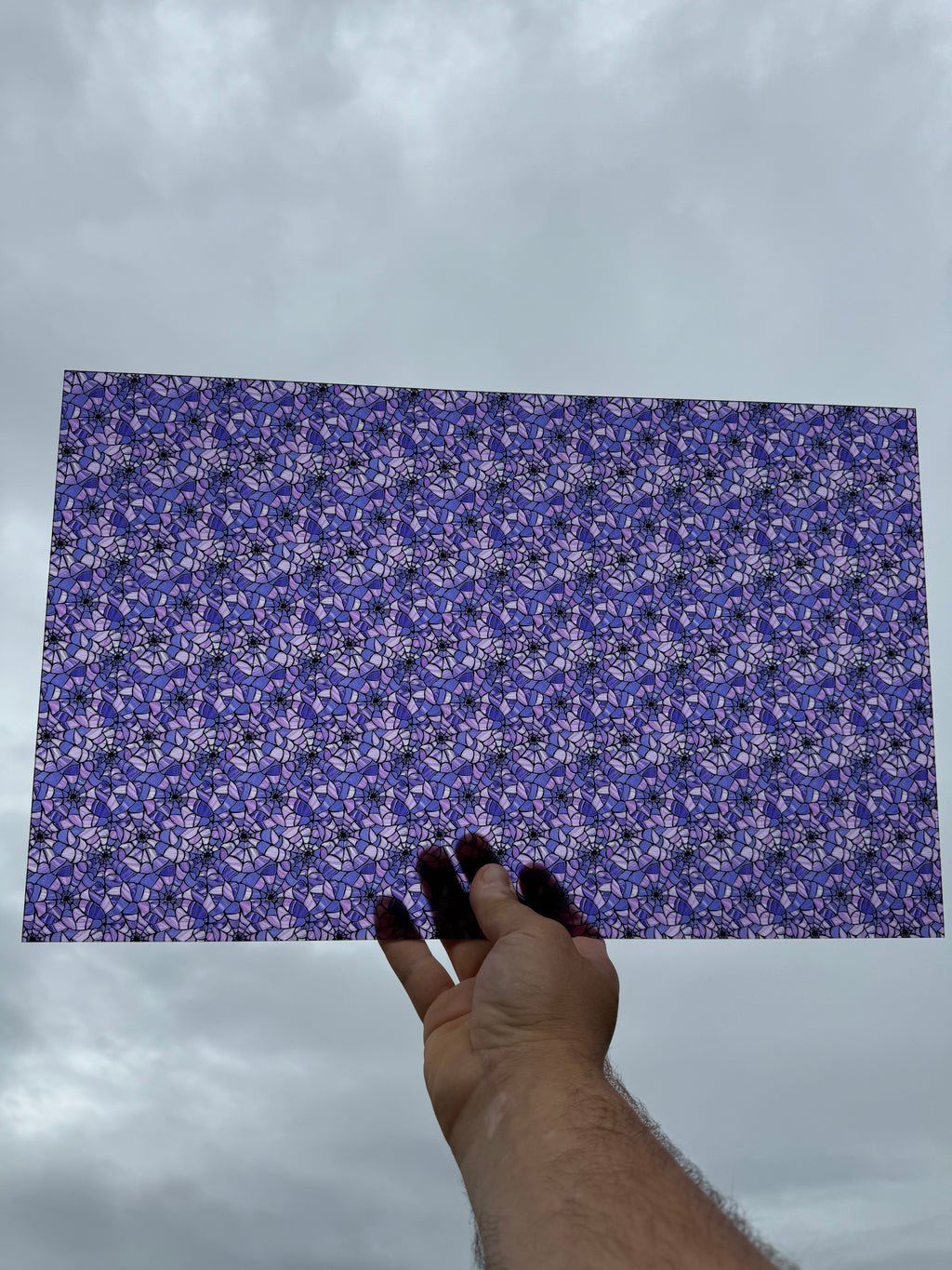 PatternPly® Transparent Purple Stained Glass Spiderwebs sheet showing the pattern