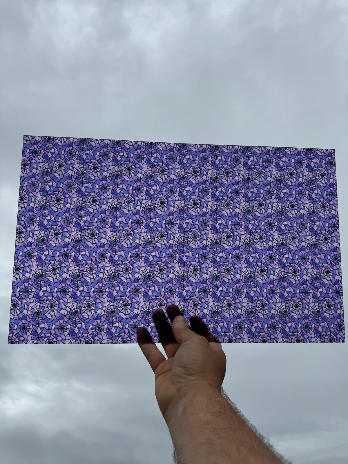PatternPly® Transparent Purple Stained Glass Spiderwebs sheet showing the pattern