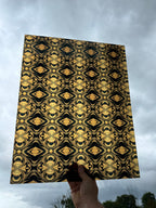 PatternPly® 19x24" Transparent Black and Gold Kaleidoscope XL Scale sheet showing the pattern