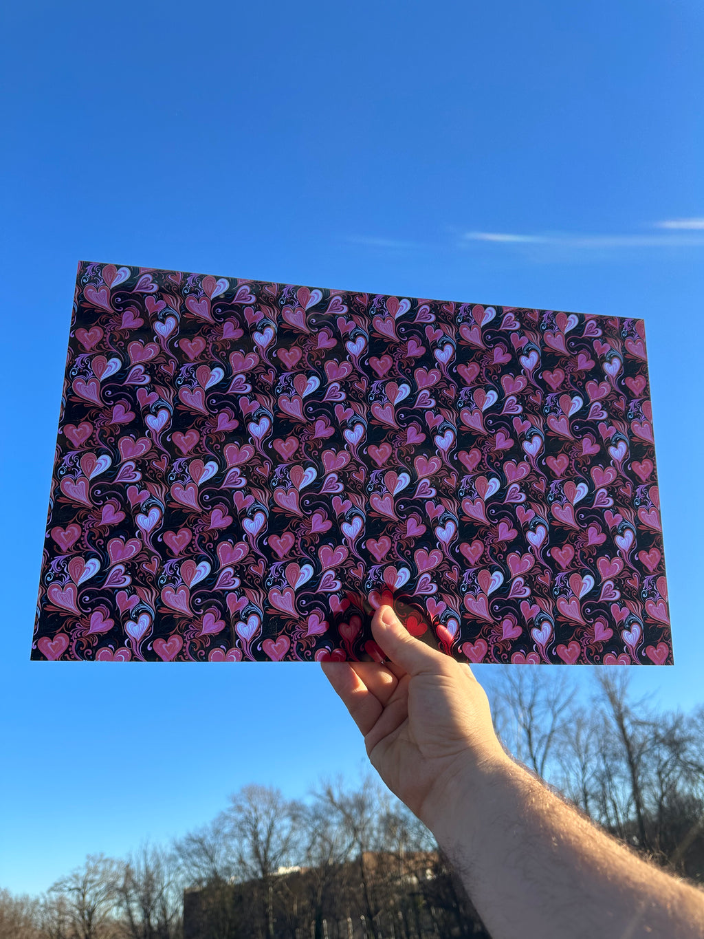 PatternPly® Transparent Black and Red Hearts sheet showing the pattern