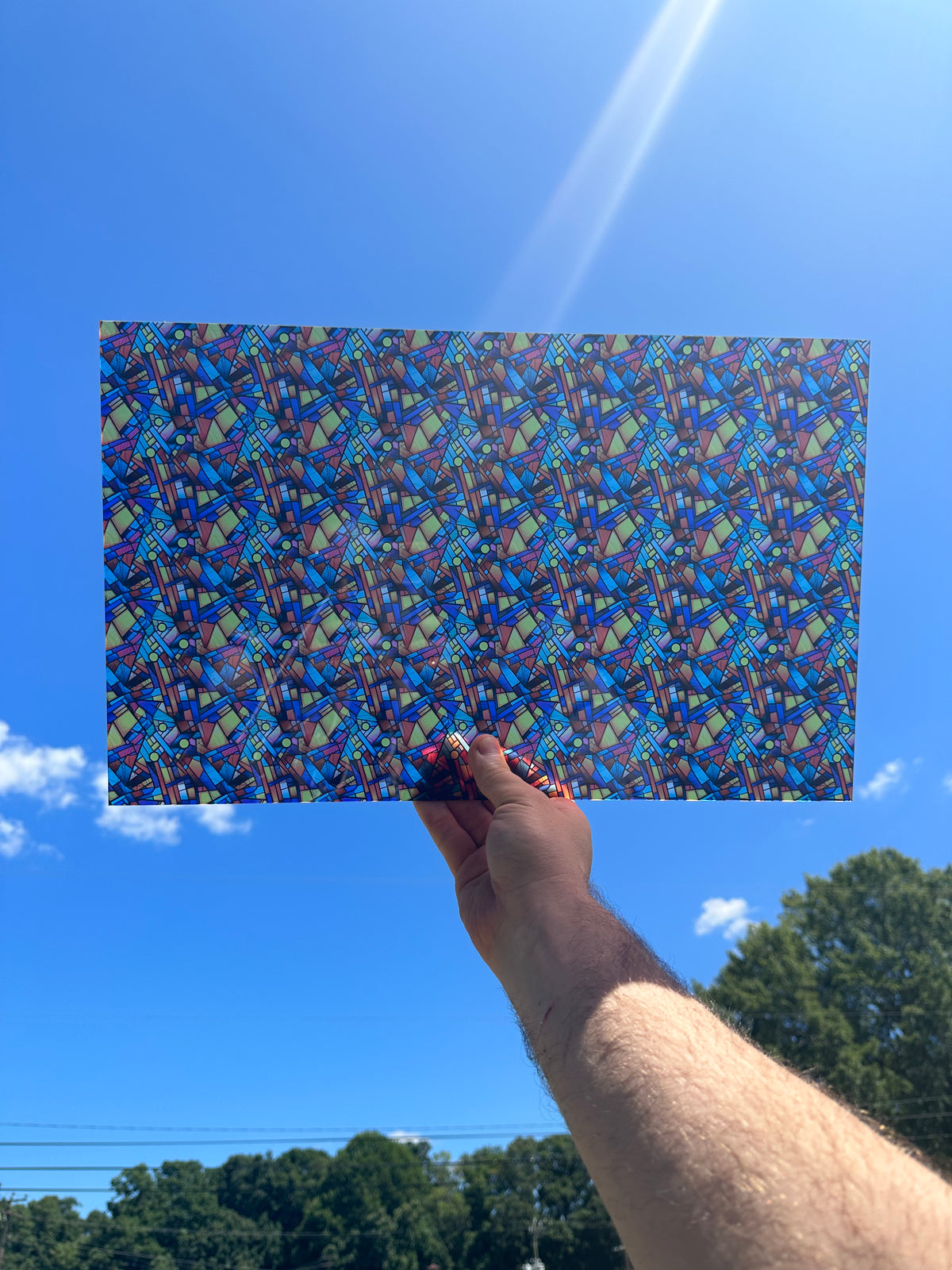 PatternPly® Transparent Bright Geometric Stained Glass sheet showing the pattern