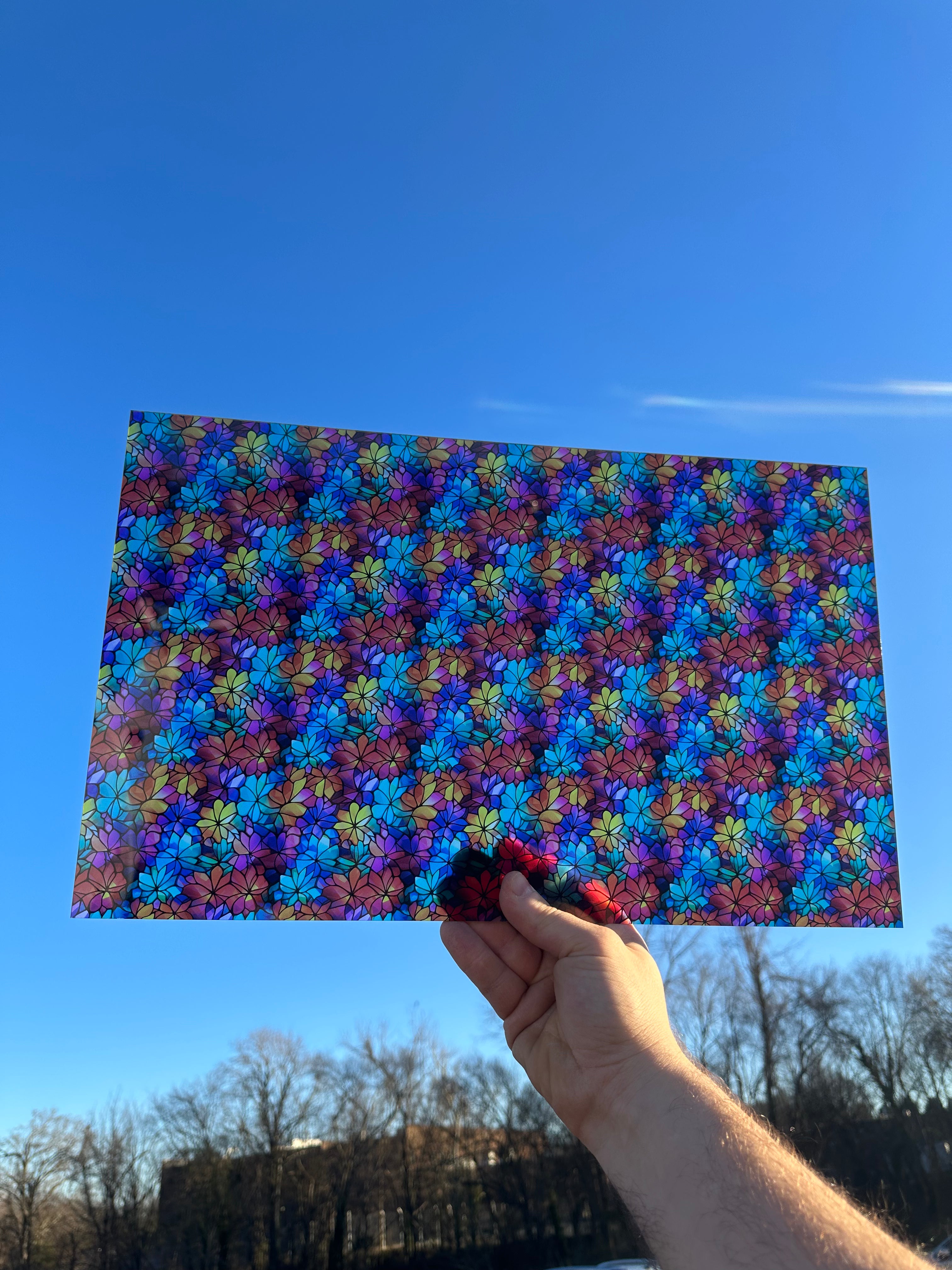 PatternPly® Transparent Geometric Floral Stained Glass sheet showing the pattern