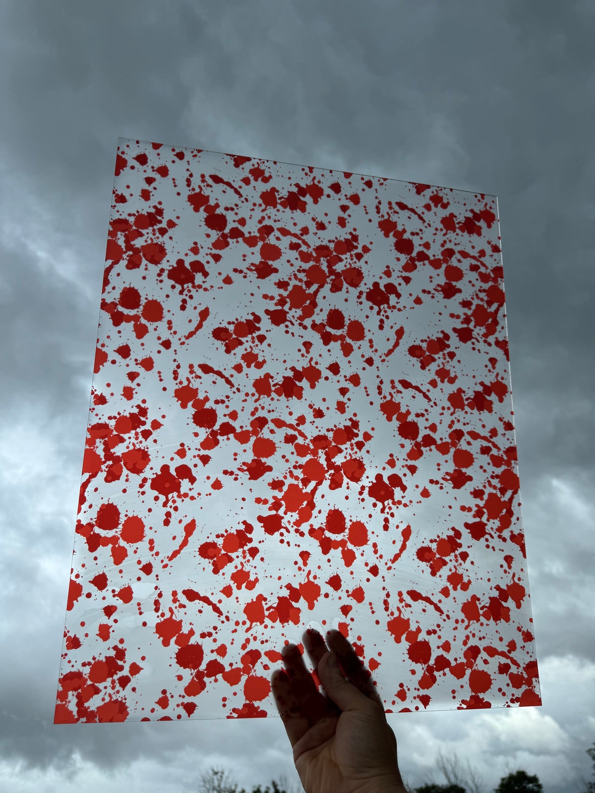 PatternPly® 19x24" Transparent Blood Splatter XL Scale sheet showing the pattern