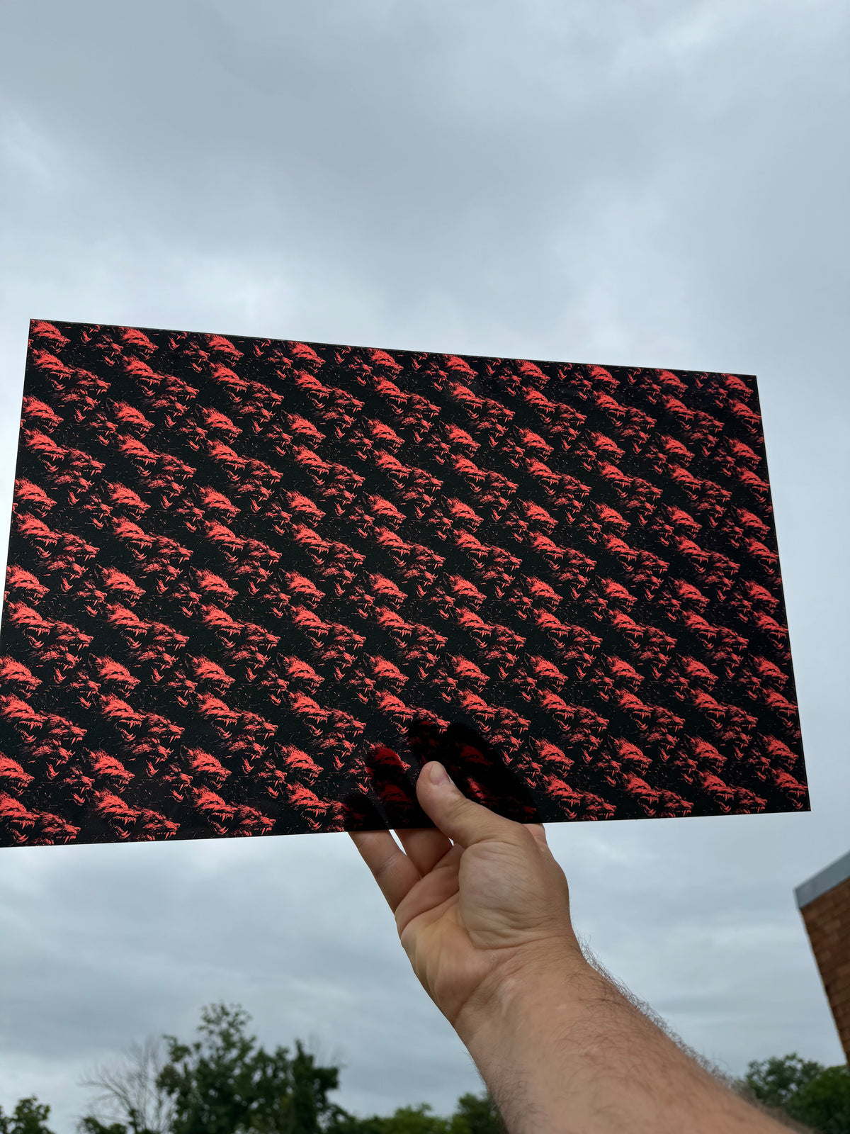 PatternPly® Transparent Red Werewolves sheet showing the pattern