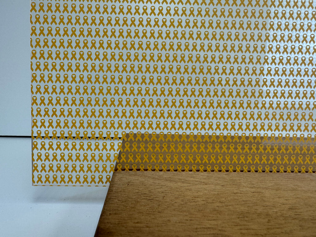 PatternPly® Scattered Mini Light Orange Ribbons sheet showing the pattern