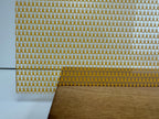 PatternPly® Scattered Mini Light Orange Ribbons sheet showing the pattern