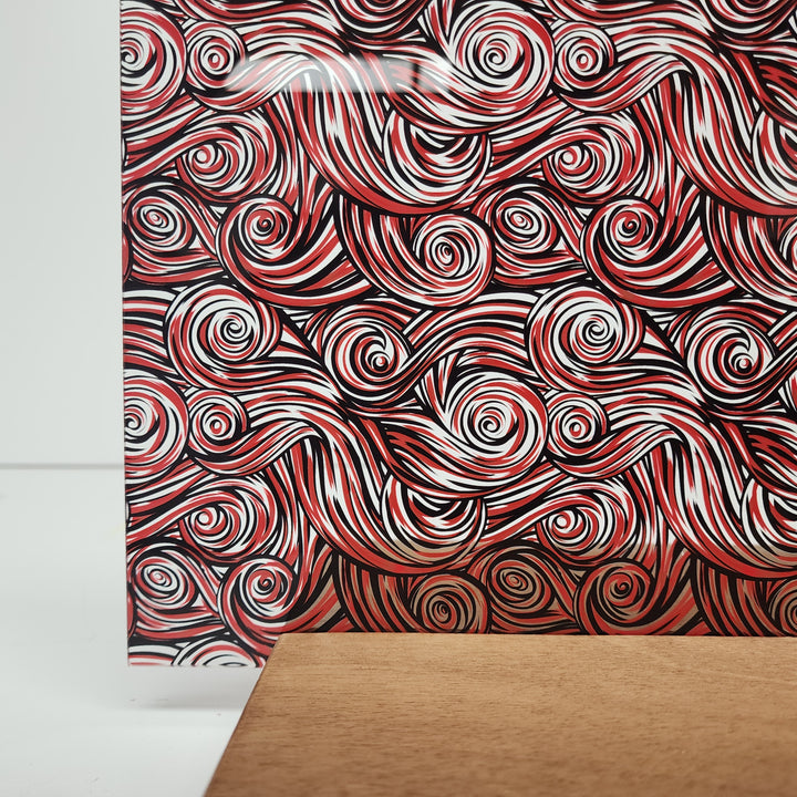 PatternPly® Scattered Red and Black Swirls