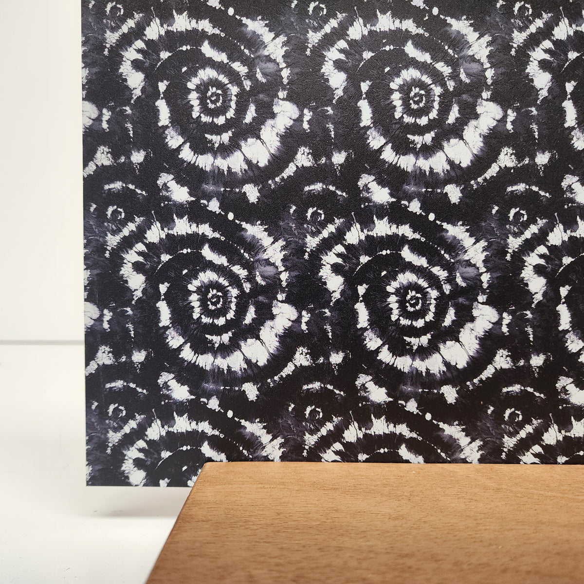 PatternPly® Full Coverage Black and White Tie Dye sheet showing the pattern