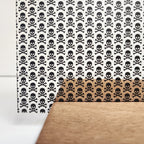 PatternPly® Scattered Black Skull and Crossbones sheet showing the pattern