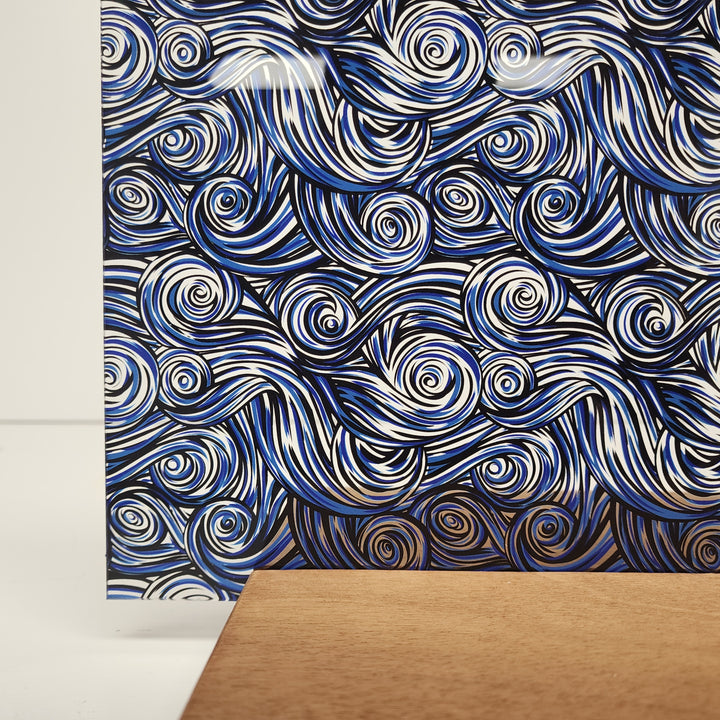 PatternPly® Scattered Blue and Black Swirls