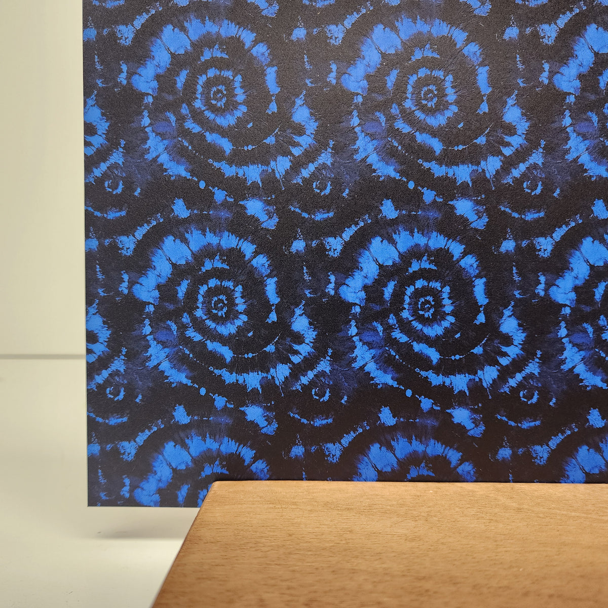 PatternPly® Full Coverage Blue and Black Tie Dye sheet showing the pattern