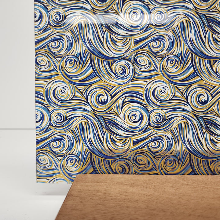 PatternPly® Scattered Blue and Gold Swirls