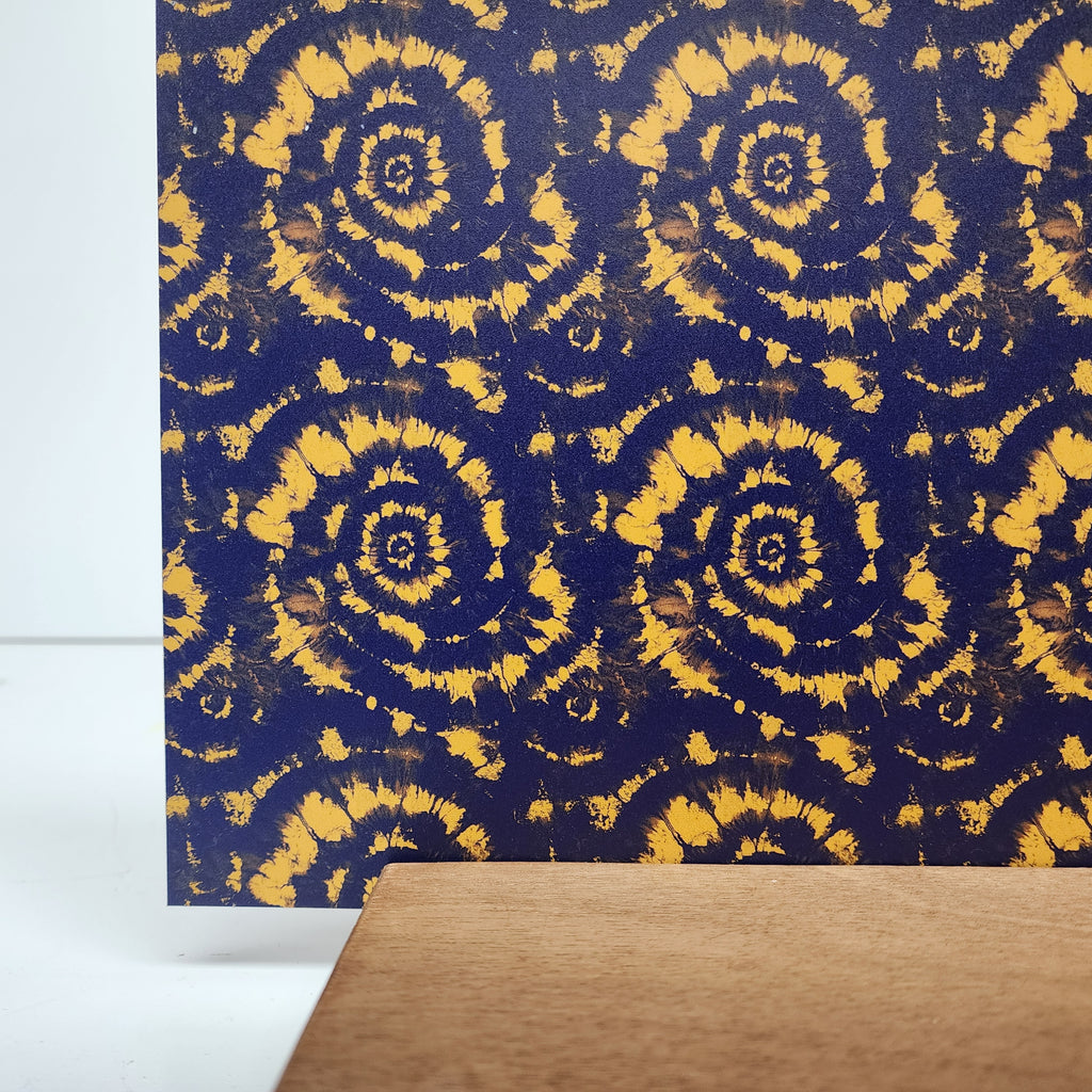 PatternPly® Full Coverage Blue and Gold Tie Dye sheet showing the pattern