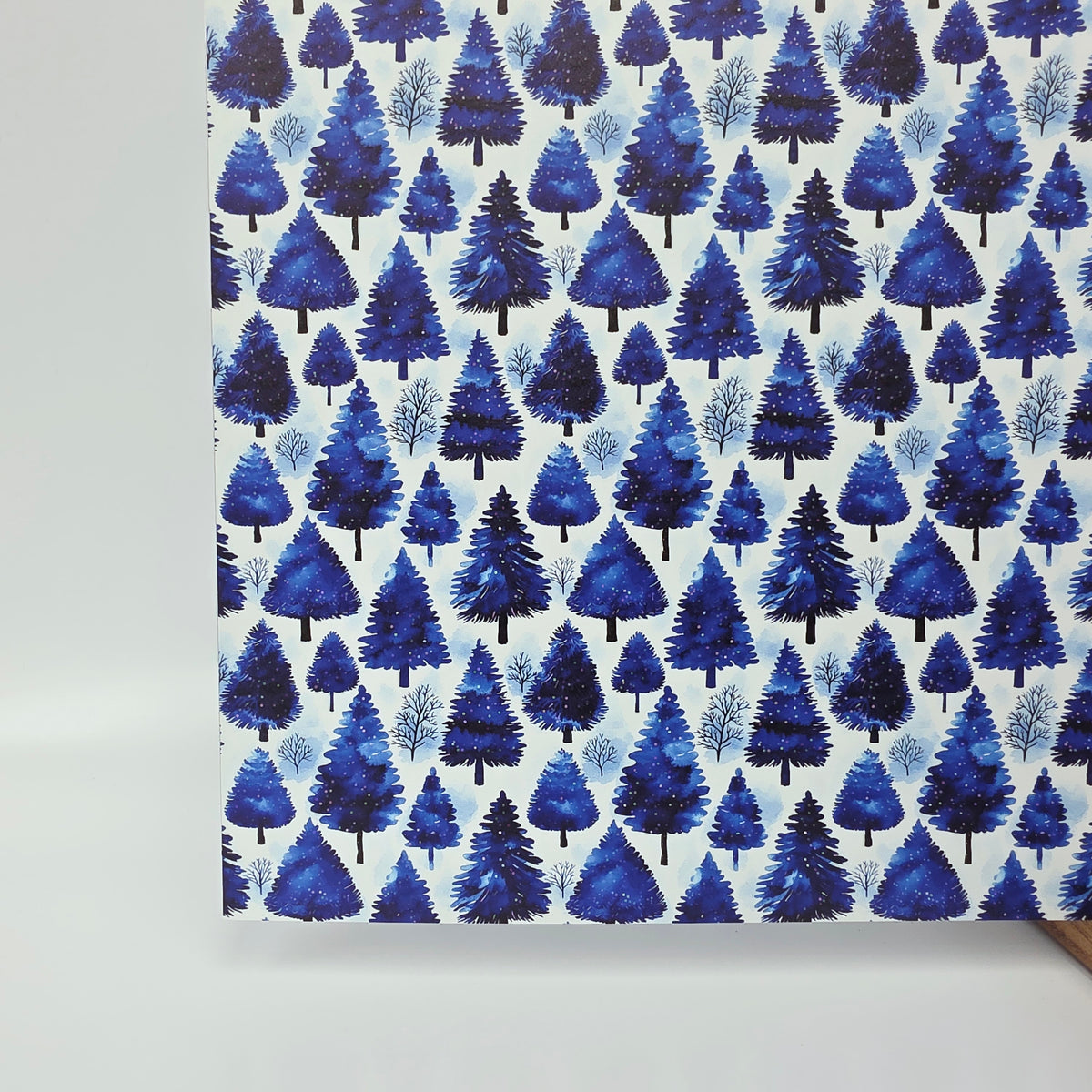 PatternPly® Full Coverage Blue Watercolor Christmas Trees sheet showing the pattern