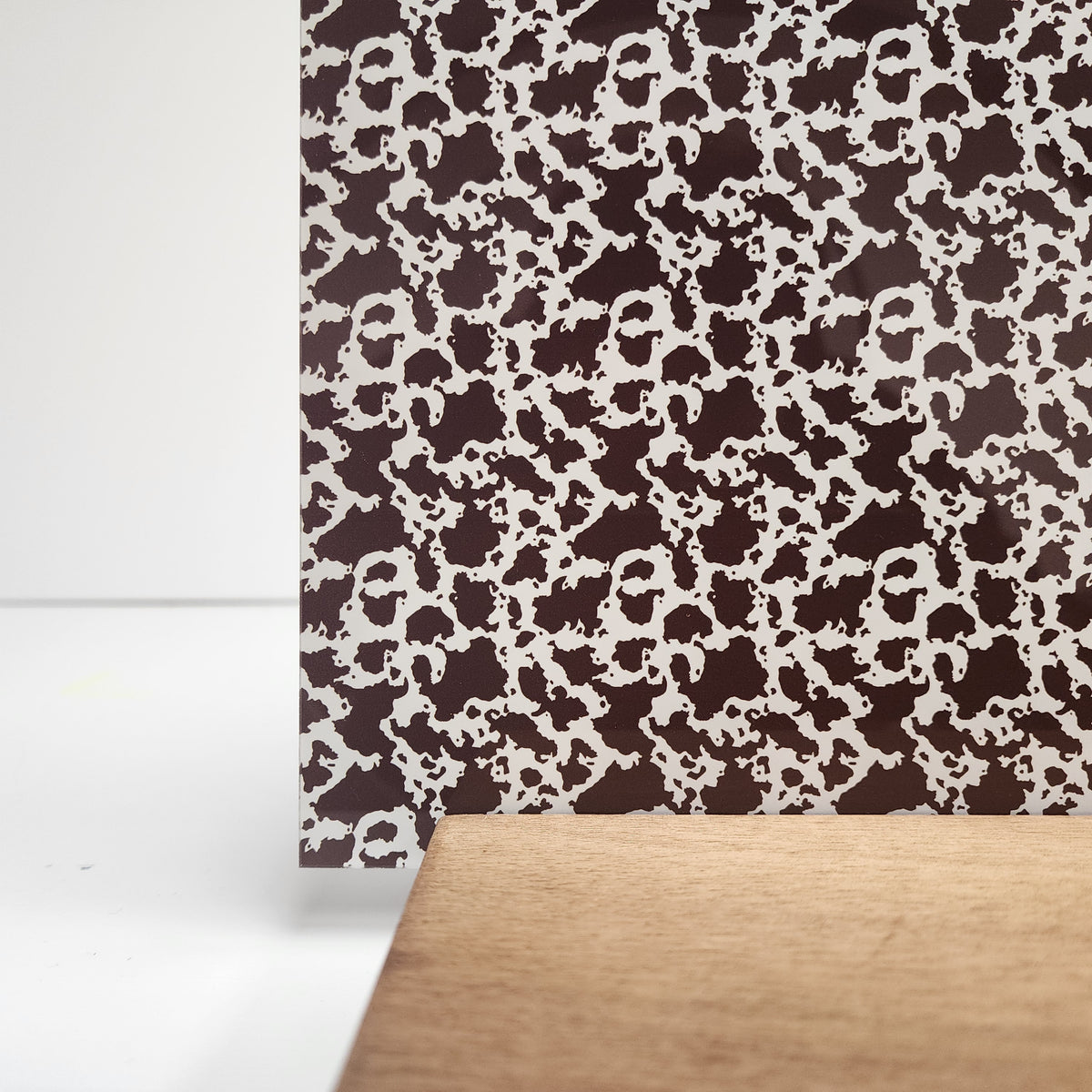 PatternPly® Full Coverage Brown Cow Spots sheet showing the pattern