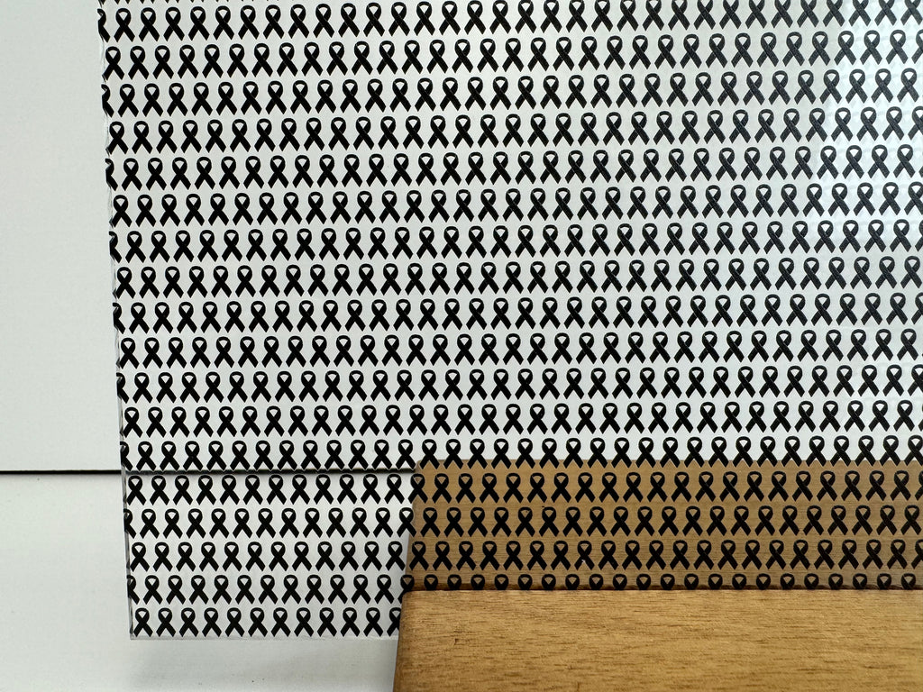 PatternPly® Scattered Mini Black Ribbons sheet showing the pattern